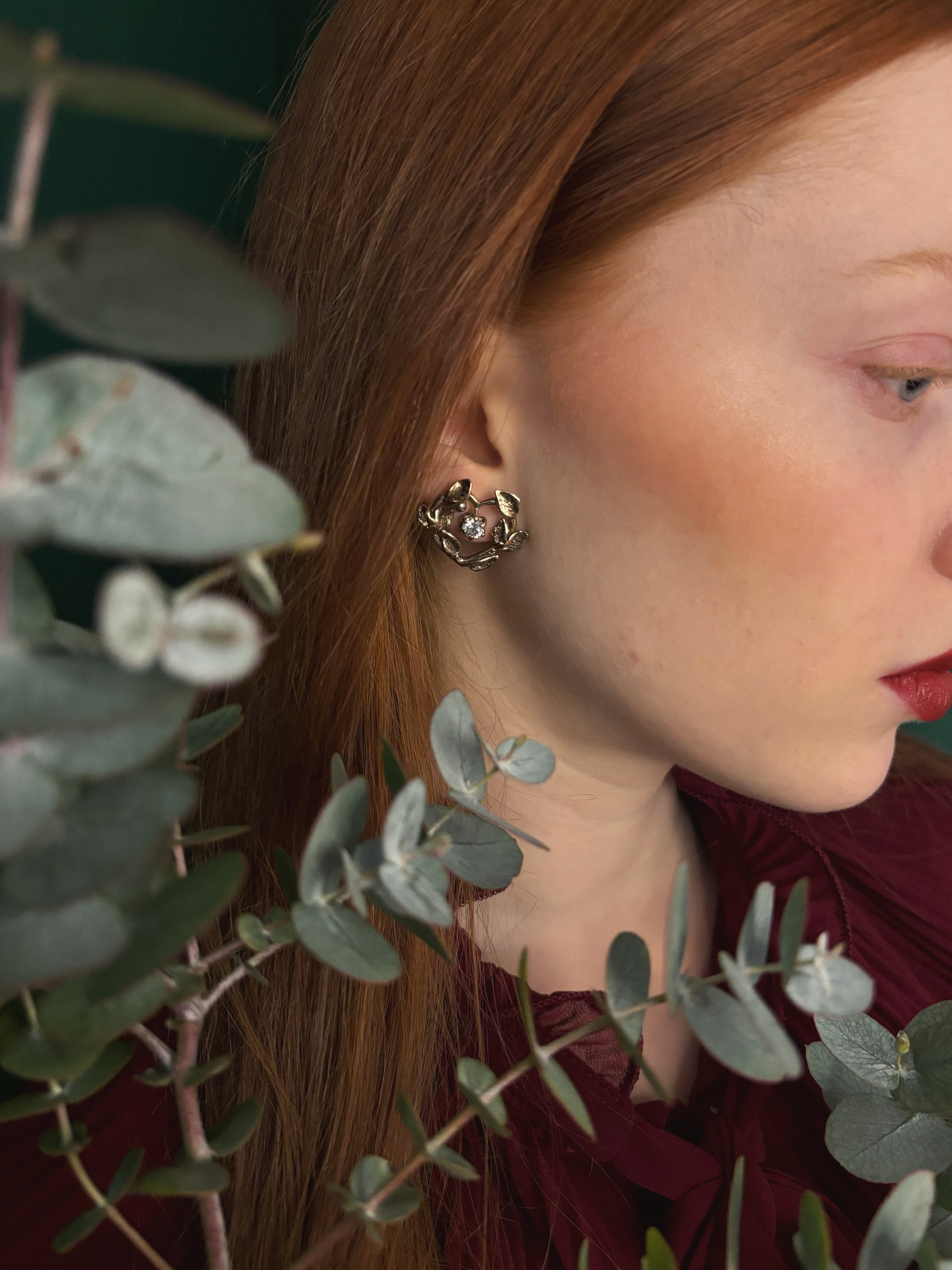 Orecchini cuore ramo punto luce