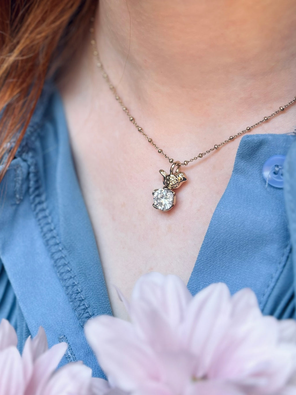 Collana passerotto con fiore zircone